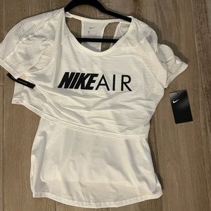 Brand new Nike workout shirt with built in tank